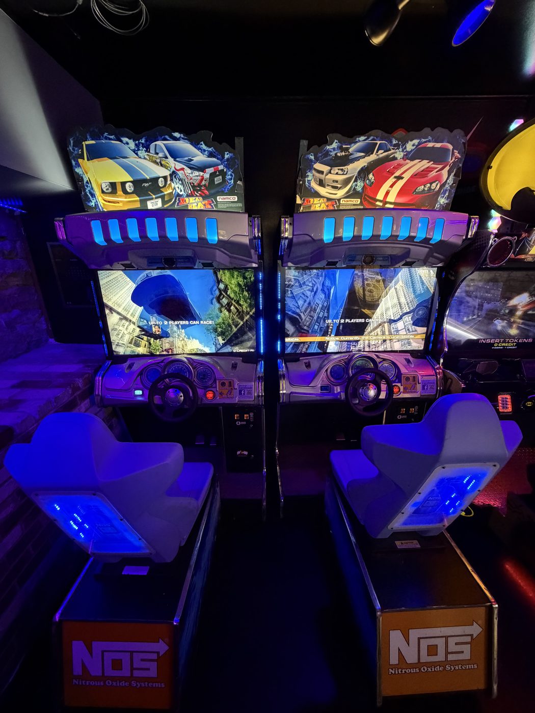 Need for Speed Underground twin-cabinet arcade racing rig by Global VR